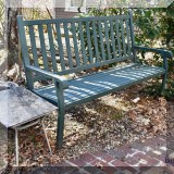 L07. Green painted outdoor bench.
